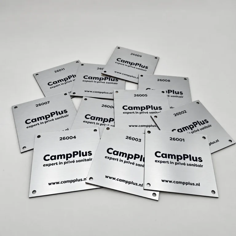 CampPlus plates cut and engraved by SDLG, showing the corners, fixing holes and lettering