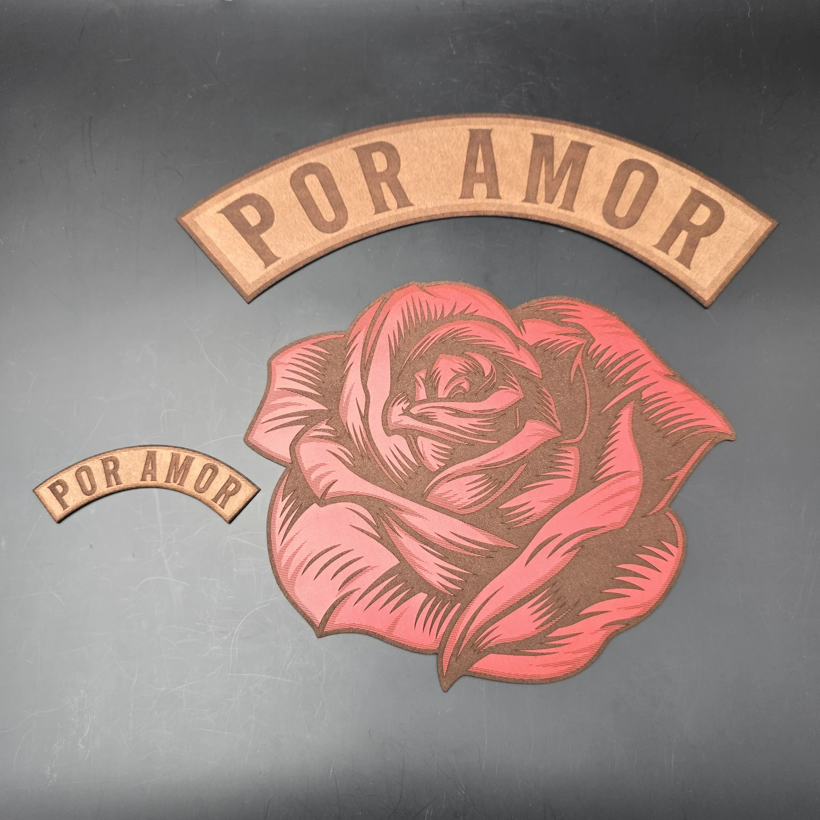 Leather rose and POR AMOR lettering with laser engraving and cut contours
