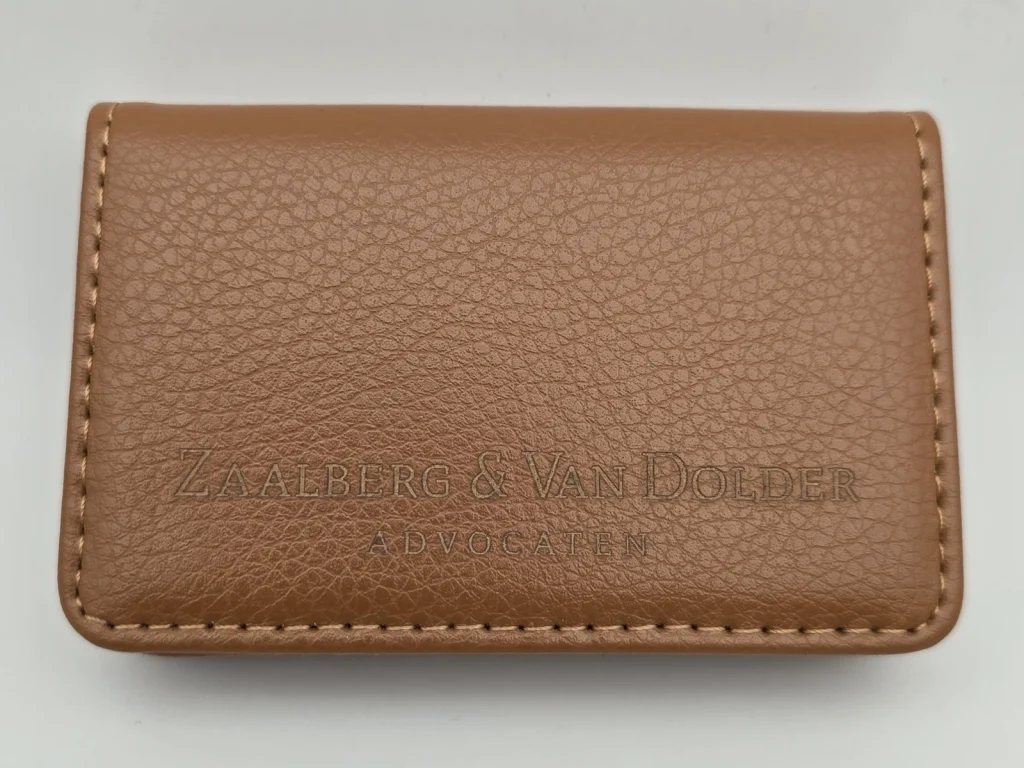 Engraved business card holders: brown PU holder with the subtle Zaalberg & Van Dolder Advocaten logo